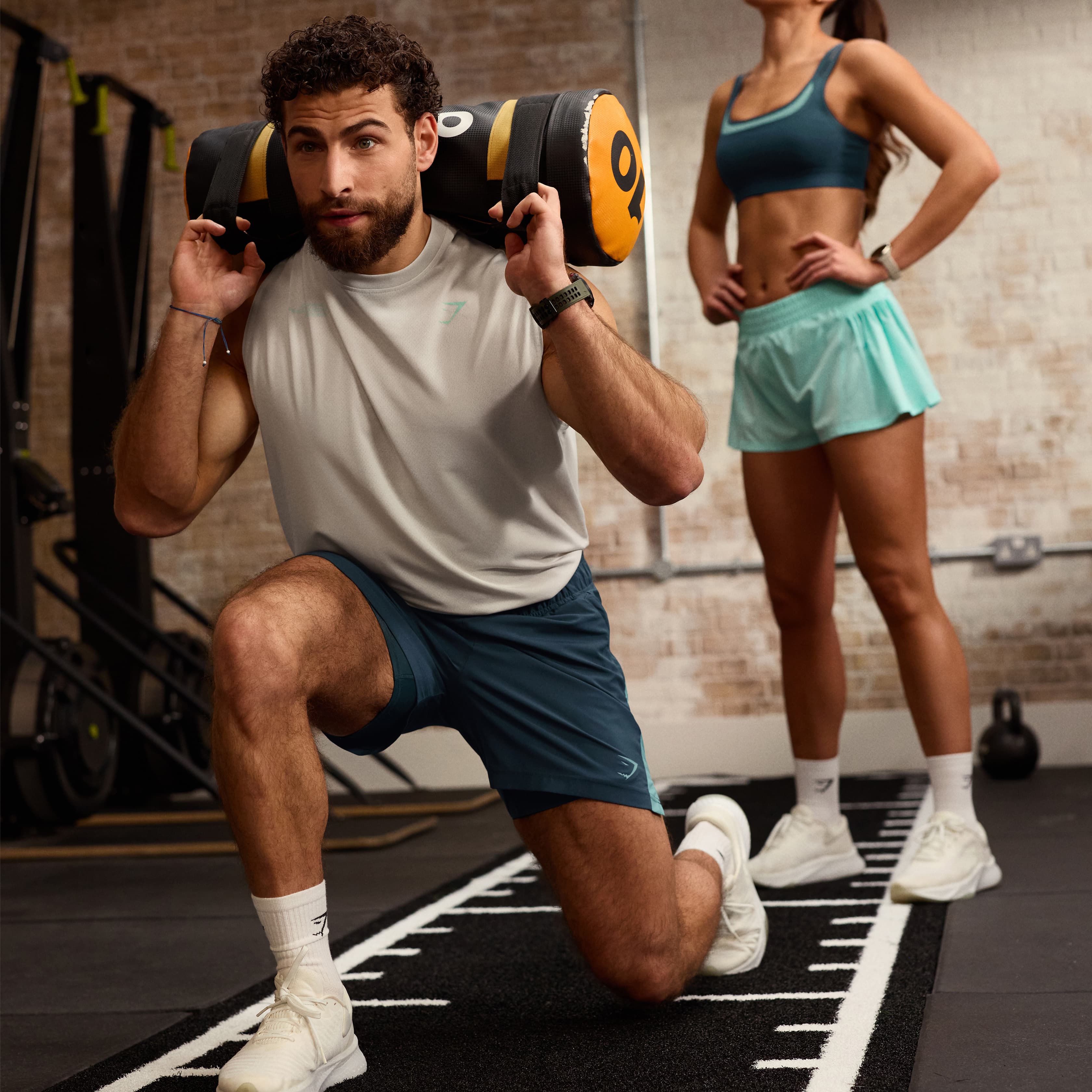 Perfect Your Sandbag Lunges With These Technique Tips