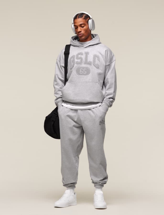 Why Do People Wear Hoodies in the Gym: Comfort Unveiled