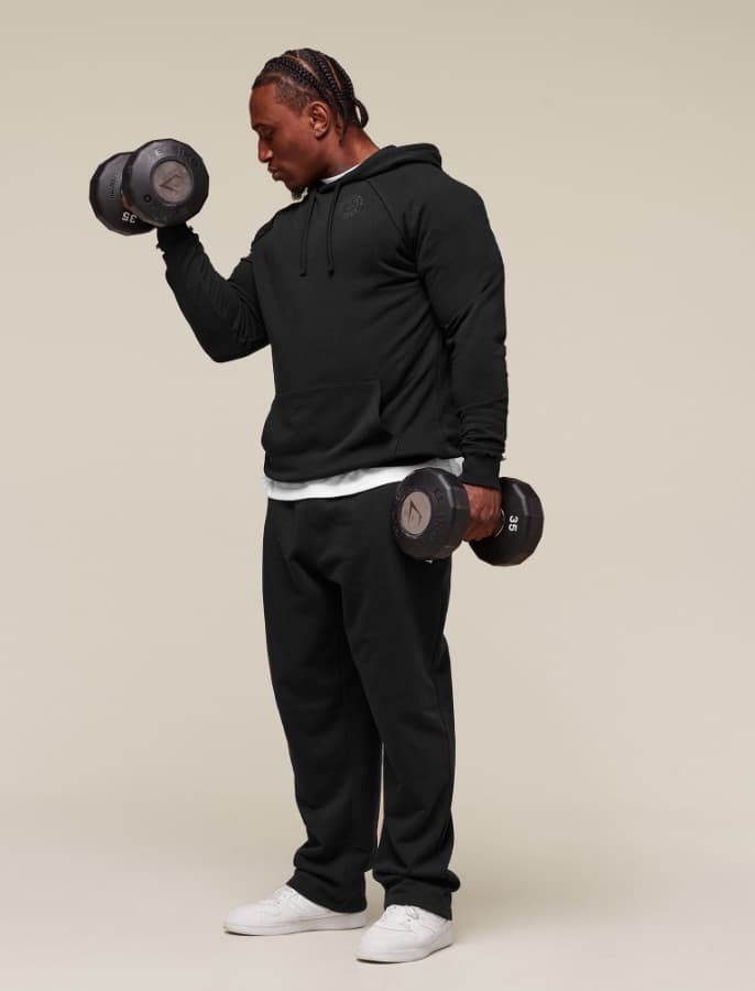 Why Do People Wear Hoodies in the Gym: Comfort Unveiled